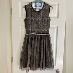 Like new Anthropologie one piece tank dress. Knit lace on top with tulle skirt